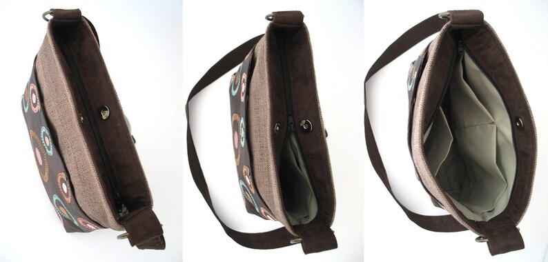 May include: A brown canvas shoulder bag with a zipper closure and a colorful geometric pattern. The bag has a brown strap and a beige lining.