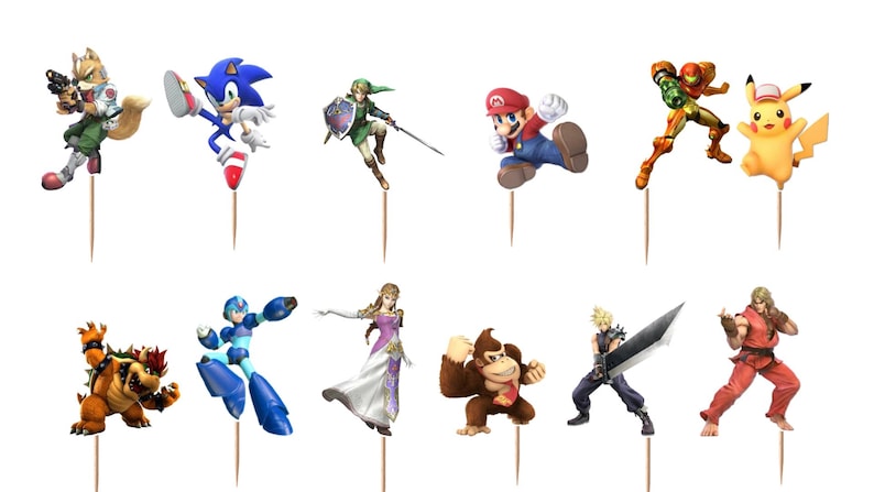 Pu&ograve; includere: Un set di dodici decorazioni per cupcake raffiguranti vari personaggi colorati dei videogiochi, tra cui Fox, Sonic, Link, Mario, Samus, Pikachu, Bowser, Mega Man, Zelda, Donkey Kong, Cloud e Ken, ciascuno fissato su uno stuzzicadenti in legno.