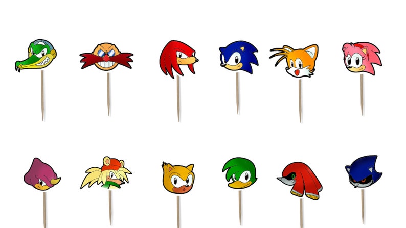 Puede incluir: Una colecci&oacute;n de doce recortes de caras de personajes en palitos de madera, con varios personajes de la franquicia Sonic the Hedgehog. Los personajes incluyen a Sonic, Tails, Knuckles y Dr. Eggman, en colores vibrantes.