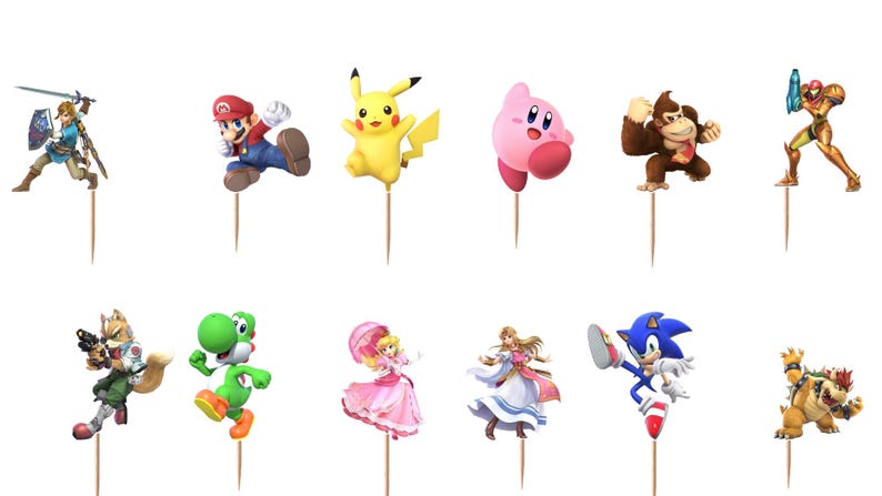 May include: A set of twelve decorative cupcake toppers featuring various video game characters including Link, Mario, Pikachu, Kirby, Donkey Kong, Samus, Fox, Yoshi, Peach, Zelda, Sonic, and Bowser, each attached to a thin wooden toothpick.