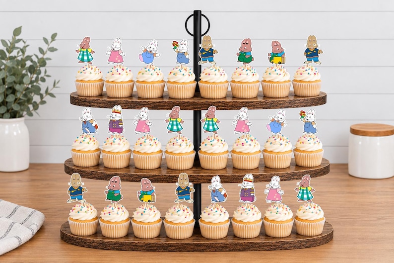 May include: A three-tiered dark wood cupcake stand holding twenty-four cupcakes, each topped with a colorful paper cutout of a cartoon rabbit character. The stand features a central black metal handle and oval-shaped shelves with a wood grain finish.