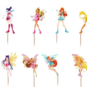 May include: A set of twelve decorative cupcake toppers featuring various animated fairy characters in colorful outfits and wings, each attached to a thin wooden pick. The characters display diverse hair colors, poses, and wing designs.