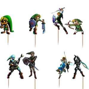 Op de afbeelding: Een set van twaalf decoratieve cupcake-toppers met diverse ge&iuml;llustreerde personages uit de Legend of Zelda-serie, elk bevestigd op een dunne houten tandenstoker. De figuren omvatten verschillende versies van Link, een Deku Scrub en Epona.