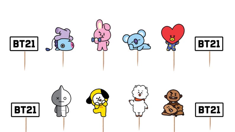 Peut inclure: Un ensemble de d&eacute;corations pour cupcakes BT21 sur des pics en bois. La collection comprend Mang, Cooky, Koya, Tata, Van, Chimmy, RJ et Shooky, ainsi que quatre panneaux rectangulaires avec le texte noir BT21 sur fond blanc.