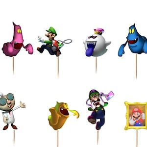 May include: A set of twelve decorative food picks featuring various characters and elements from the Luigi's Mansion video game series, including Luigi with a vacuum, several colorful ghosts, a haunted mansion, a scientist, and a framed portrait.