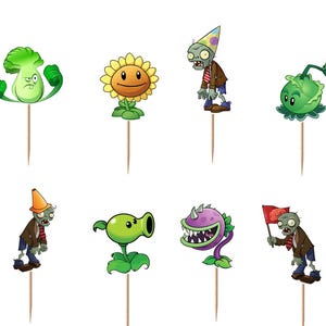 May include: A set of twelve decorative cupcake toppers featuring colorful illustrations of various characters including zombies, a sunflower, a walnut, a peashooter, a chomper, and a chili pepper, each attached to a thin wooden pick for insertion.