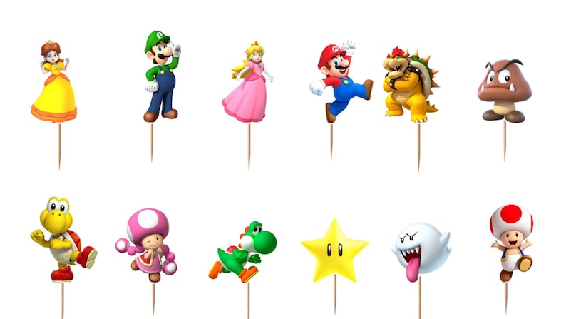 May include: A set of twelve decorative cupcake toppers featuring various Super Mario characters and icons, including Mario, Luigi, Princess Peach, Daisy, Bowser, Goomba, Koopa Troopa, Toadette, Yoshi, a yellow star, a Boo ghost, and Toad.