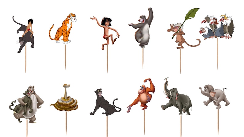 May include: A set of twelve decorative cupcake toppers featuring various animated characters from The Jungle Book, including a boy, a tiger, a bear, a panther, a snake, an orangutan, an elephant, and vultures, each attached to a wooden pick.