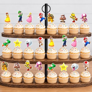 May include: A three-tiered wooden cupcake stand holding twenty-four cupcakes, each topped with a colorful paper cutout of a Super Mario character, including Mario, Luigi, Princess Peach, Bowser, Toad, Yoshi, Goomba, Koopa Troopa, Boo, and a star.