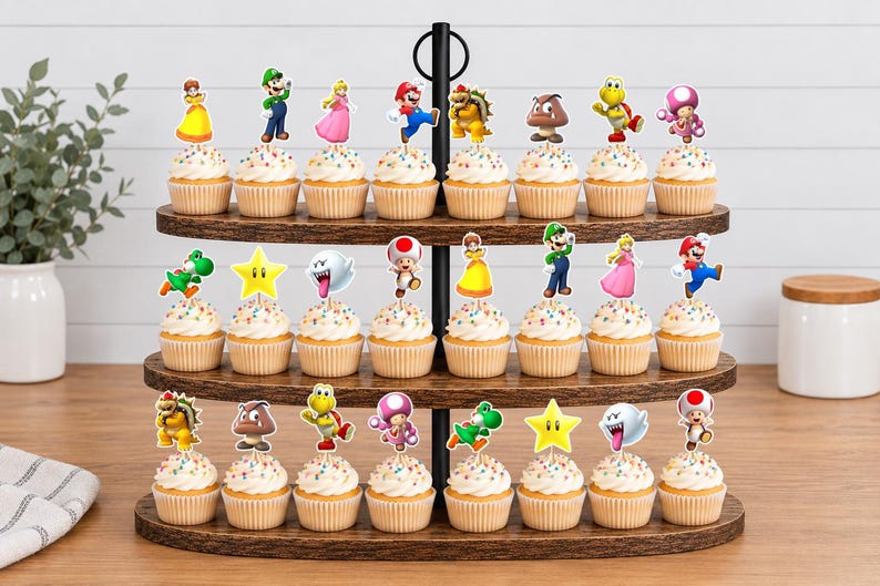 May include: A three-tiered wooden cupcake stand holding twenty-four cupcakes, each topped with a colorful paper cutout of a Super Mario character, including Mario, Luigi, Princess Peach, Bowser, Toad, Yoshi, Goomba, Koopa Troopa, Boo, and a star.