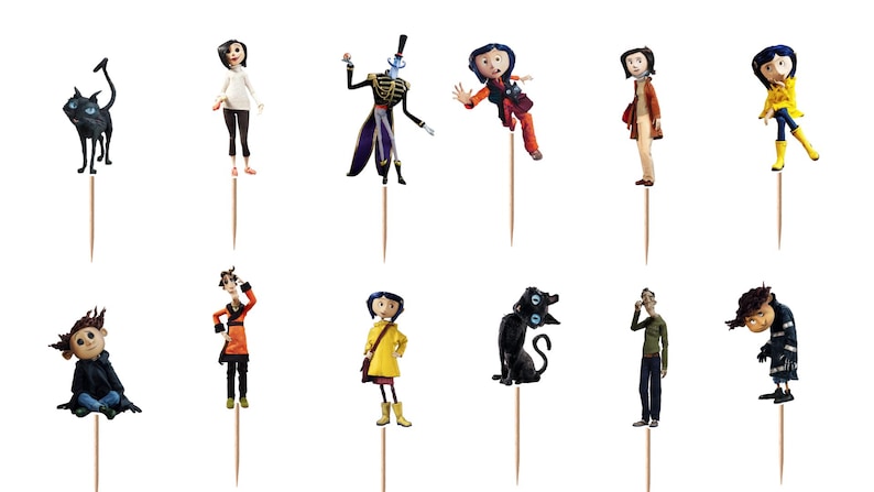 May include: A collection of character figurines from the animated film, "Coraline", mounted on wooden sticks. The figurines include Coraline, the cat, and other characters in various poses. The figures are set against a white background.