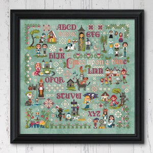 cross stitch pattern of Grimm's Fairy Tales stitched with DMC thread on aqua aida