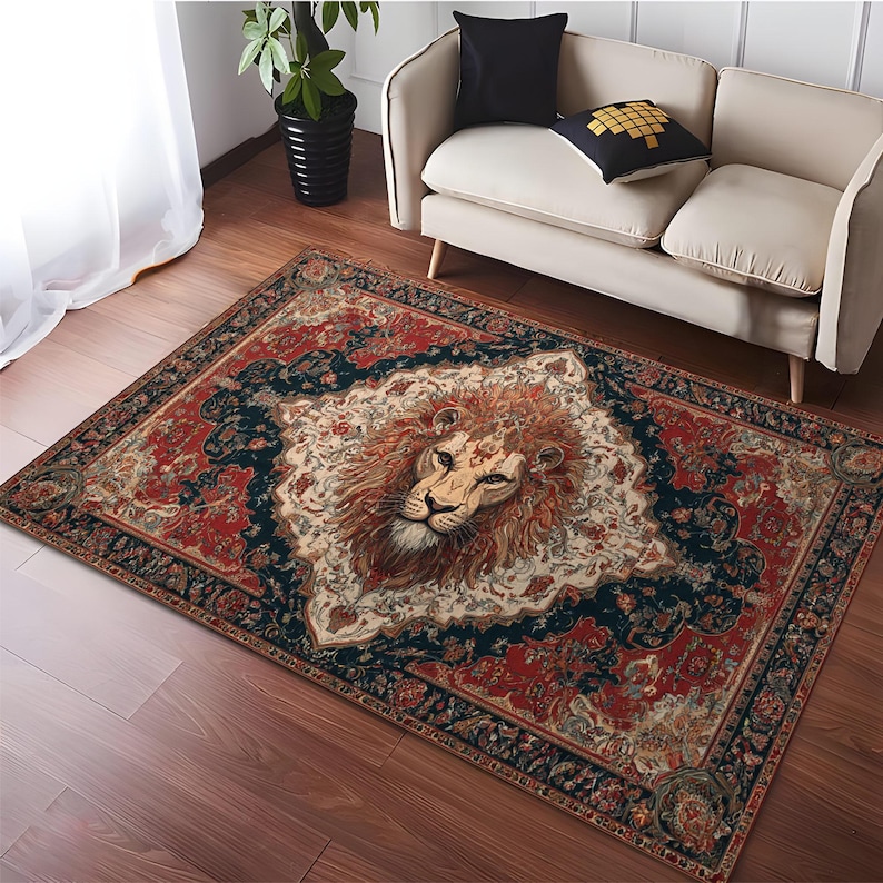 May include: A rectangular area rug with a lion's face in the center. The rug features a red, navy, and cream color palette with an ornate border. The lion's mane is a warm brown, and the rug has a vintage, Persian-inspired design.