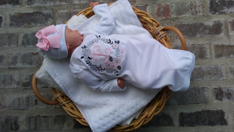 Options when checking out for purchase as just layette, layette with beanie or 3 piece set that includes layette, beanie, and blanket.