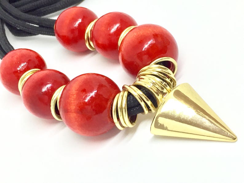 multi rings and Arrow head design Nylon Cord necklace with wood beads The Akan Collection