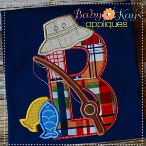 May include: A red, orange, and blue plaid letter B with a brown fishing rod, a yellow and blue fish, and a white and brown fishing hat. The letter B is outlined in red.