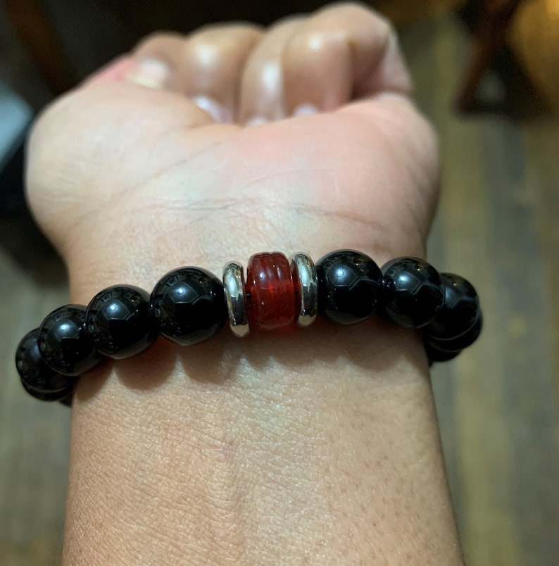black agate rounds glass Padre beads red Czech rondelles with stainless steel accents Accra Dreams bracelet Krobo beads