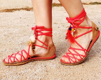 Greek espadrilles sandals with feathers and ornaments. Colour coral red. Alpargatas made in Spain