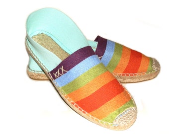 Flat espadrilles made of striped and aqua green canvas. Organic cotton. Made in Spain