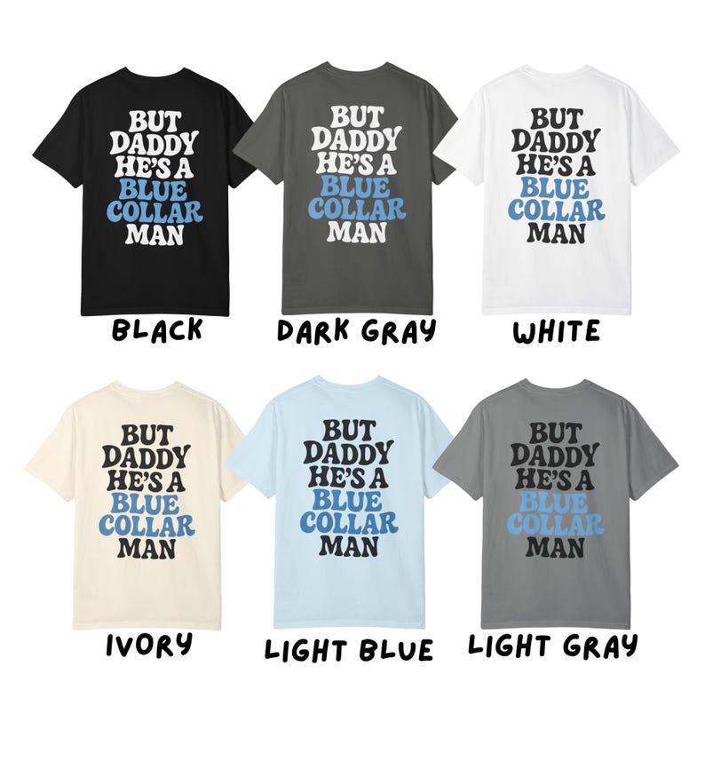 May include: Six t-shirts in various colors: black, dark gray, white, ivory, light blue, and light gray. Each shirt features the text "BUT DADDY HE'S A BLUE COLLAR MAN" in white and blue lettering.