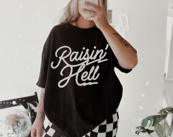 Raisin Hell Graphic Tee Shirt for Women, trendy retro country western cowgirl Midwest edgy yallternative rowdy yeehaw oversized rodeo tshirt