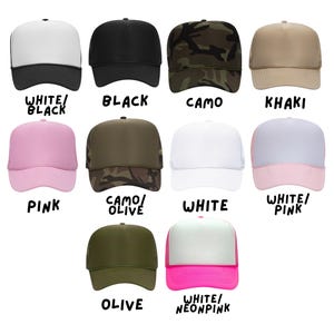 May include: Assortment of ten trucker hats in various colors and patterns, including white, black, camo, khaki, pink, olive, and neon pink. The hats have a mesh back and a solid front panel.