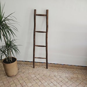 Decorative Wooden Ladder: A Stylish Towel Storage Solution
