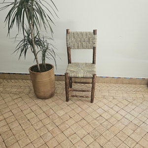 Moroccan wooden chair with palm leaf cord