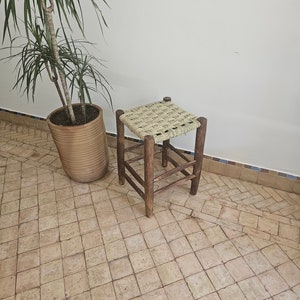 Small Moroccan stool made of wood and natural rope checkerboard weave