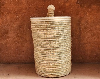 Panier rond avec pompons idéal pour tout rangement