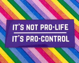 May include: Purple sticker with white text that reads "It's not pro-life, it's pro-control". The sticker is on a background of diagonal rainbow stripes.