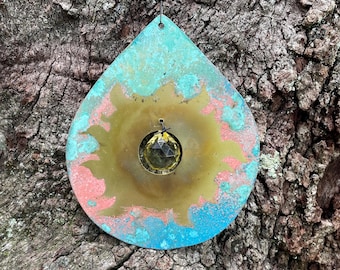 Oxidized Sun Burst impression on   Brass Sheet. Wind Spinner/Sail with 20mm Yellow light prism Sail H- 5 1/2 x W- 4 1/4 inches.