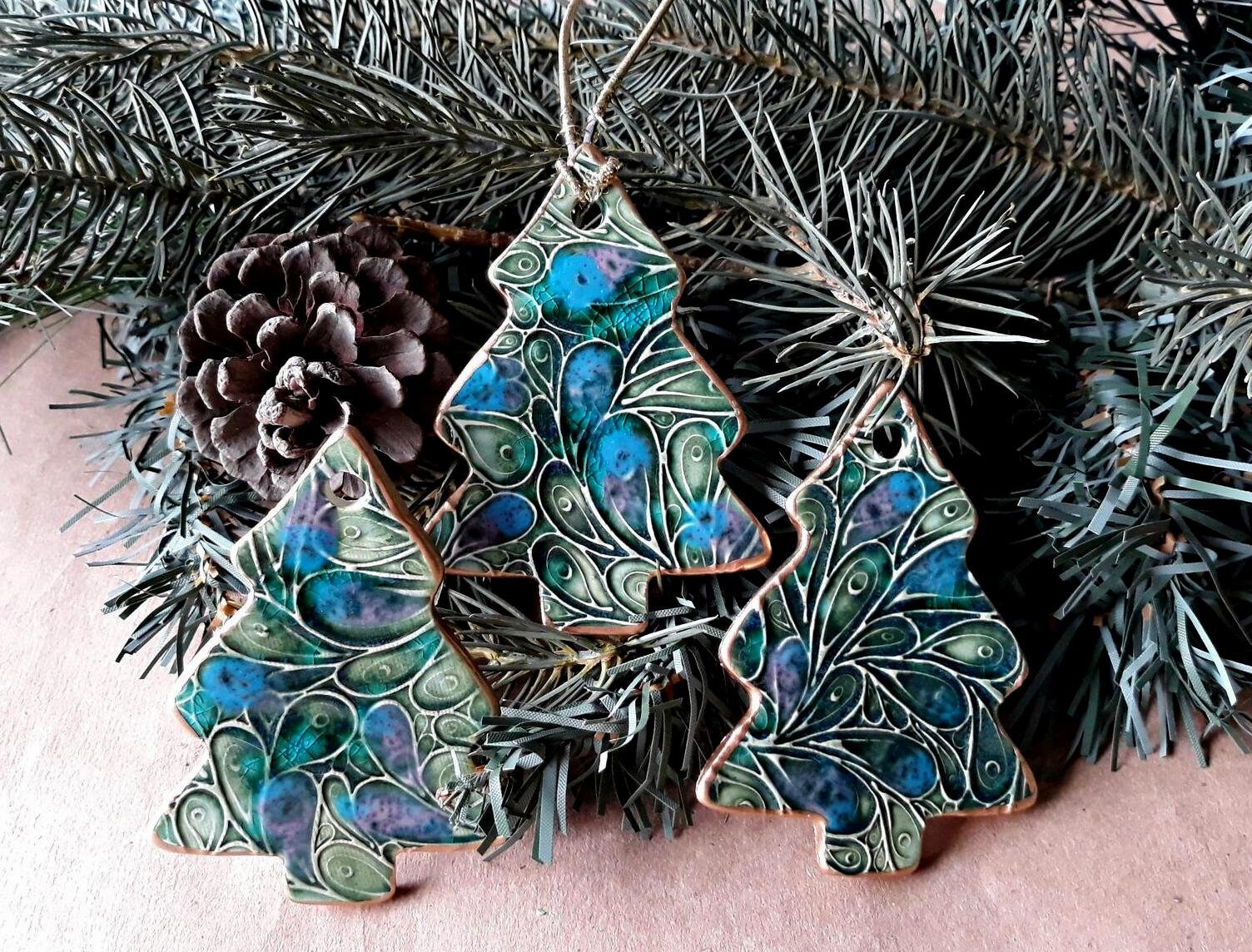 THREE Christmas Ornaments Ceramic Christmas trees edged in gold   Who…