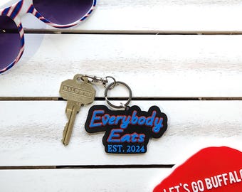 Llavero o dije para bolso "Everybody Eats Est. 2024" / Regalo para fanáticos del fútbol americano de Buffalo