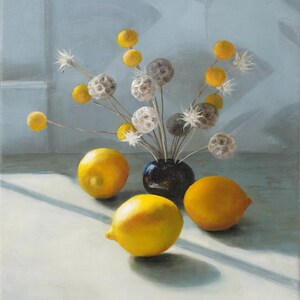 May include: A still life painting of three yellow lemons and a bouquet of dried flowers in a dark blue vase. The lemons are arranged on a white surface with a shadow cast from the vase.