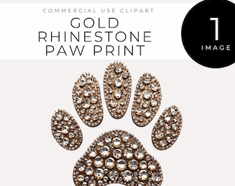 May include: Gold rhinestone paw print. This is a single paw print made of gold rhinestones.