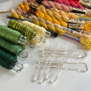 Bobbin Pegs, set of 14 in Clear, acrylic thread holders for embroidery and cross stitch, clothespins