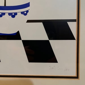 May include: A black and white checkered pattern with a blue and white abstract design in the upper left corner. The image is signed "Joel Linn /80" in the lower right corner.