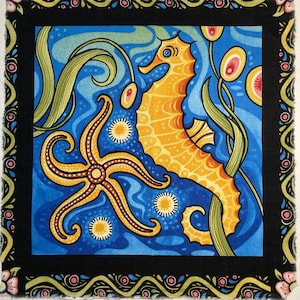 May include: Square fabric panel depicting a stylized underwater scene. A yellow seahorse and starfish are set against a blue background with green seaweed and white and yellow accents. The panel is framed with a black border.