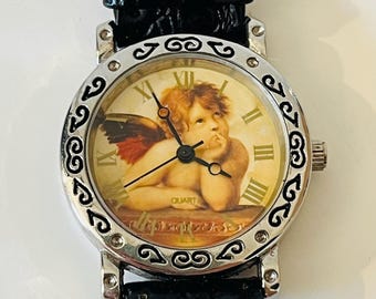 Seiko SII Raphael Cherub Gold Watch - Etsy New Zealand display picture 1