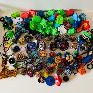 Vintage Bey Blade Collectible Toys Beyblade Mixed Lot Tops Tomy Hasbro Ripcord Launcher Parts