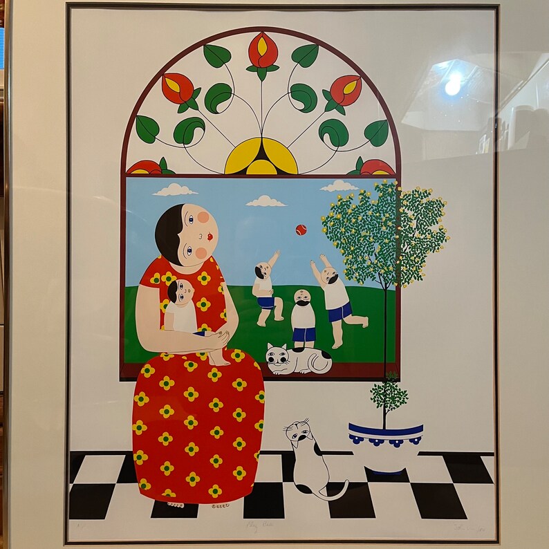May include: A colorful illustration of a woman holding a child in her arms. The woman is wearing a red dress with yellow flowers. The illustration is set against a background of a window with a stained glass design. There are also several figures playing outside the window.