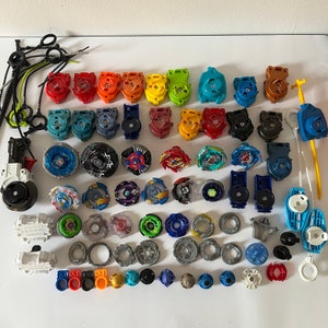 Vintage Bey Blade Collectible Toys Beyblade Mixed Lot Tops Tomy Hasbro Ripcord Launcher Parts