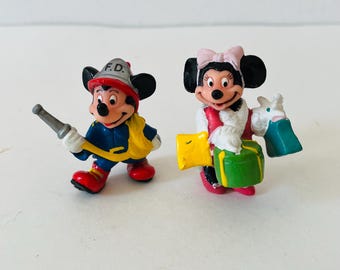 Figuras coleccionables de PVC de Mickey y Minnie de la década de 1980. Mickey Mouse bombero y Minnie de compras.