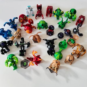 Lot of Bakugan Battle Brawler Balls 18 Total Figures Retro Toys With Travel  Case and Cards -  Canada
