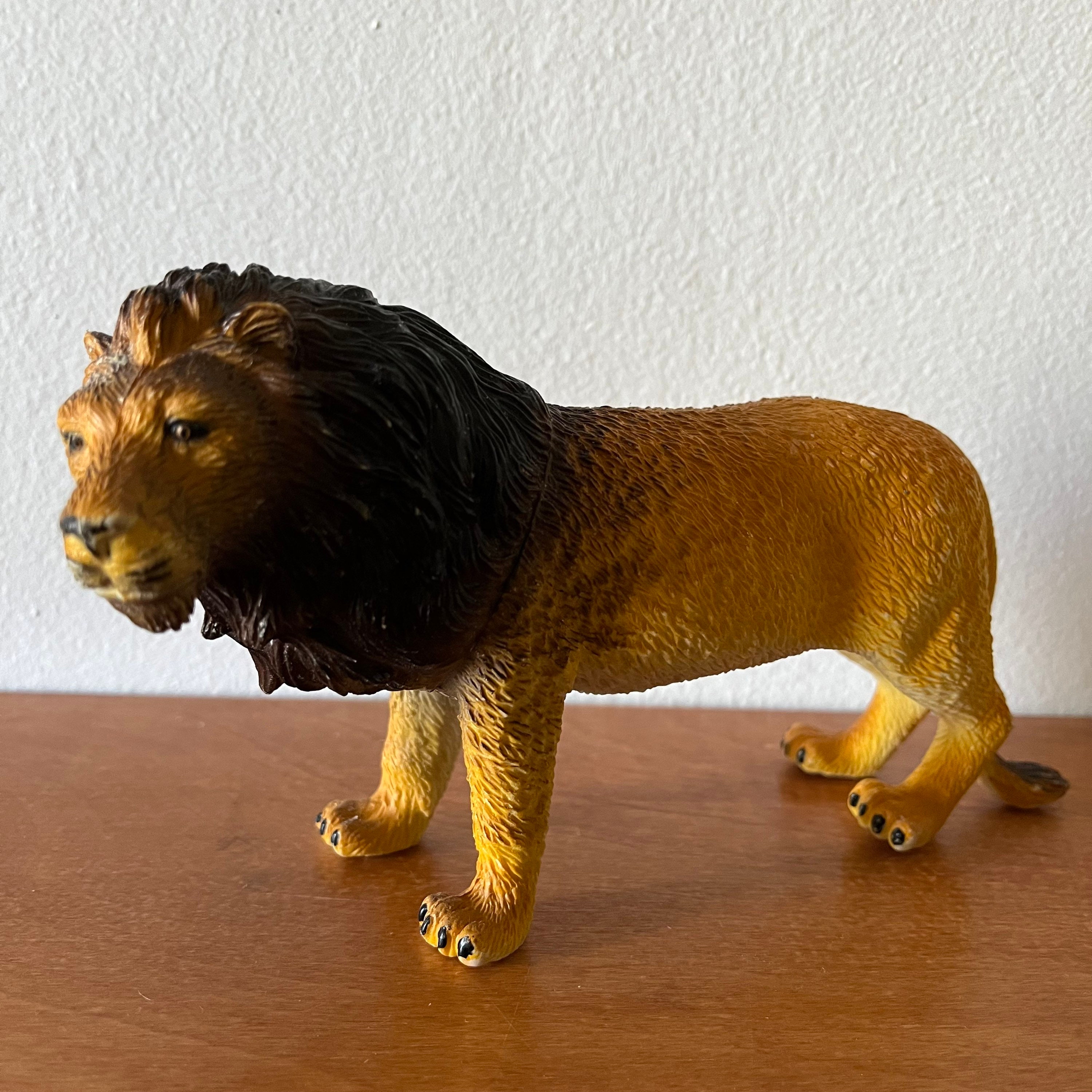 Plastic lion figurines sales