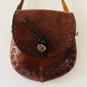 Vintage cuero con herramientas estrellas y símbolo de la paz bolso hippie bolso de hombro con correa de cuero trenzado moda de los años 70