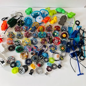 Vintage Bey Blade Collectible Toys Beyblade Mixed Lot Tops Tomy Hasbro Ripcord Launcher Parts