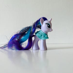 My Little Pony  Figure MLP G4 Rarity with Tinsel Hair and Cape 3.25” Brushable Pony  Friendship is Magic MLP Collectible