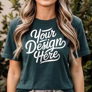 May include: A teal blue t-shirt with short sleeves and a white graphic that says "Your Design Here".